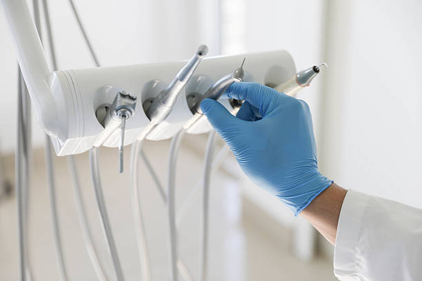 Professional Tooth Extraction technician working in Pascagoula, MS